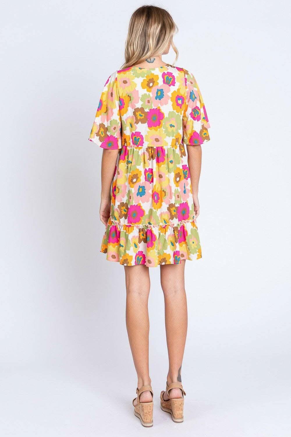 GeeGee Full Size Floral V-Neck Ruffle Trim Mini DressDiscover the GeeGee Full Size Floral V-Neck Ruffle Trim Mini Dress
 Step into a world of charm and elegance with the GeeGee Full Size Floral V-Neck Ruffle Trim Mini Love Salve -Neck Ruffle Trim Mini Dressusa