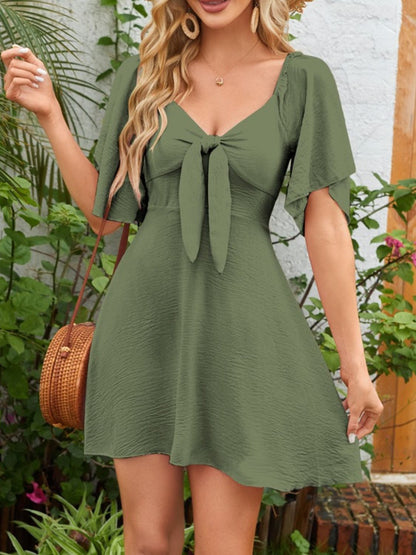 Breezy Charm Smocked Flutter Dress