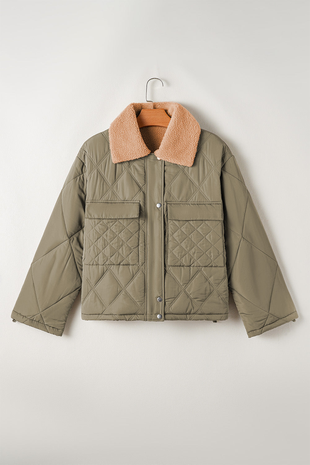 Cozy jungle green quilted puffer jacket with teddy collar and flap pockets