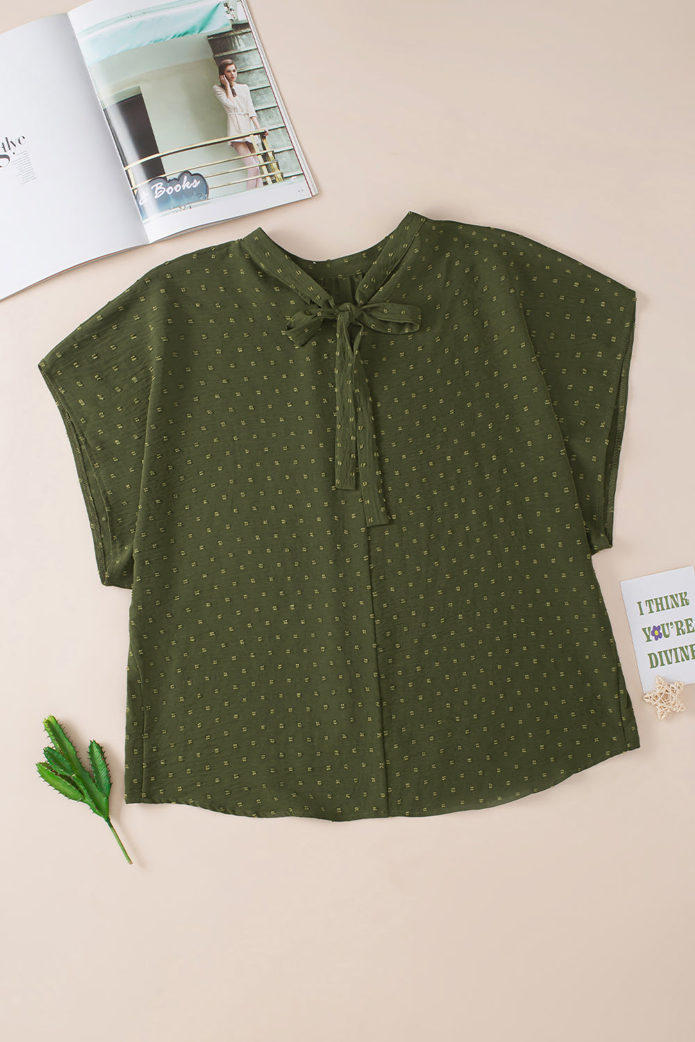 Moss green plus size swiss dot mock neck top with tie-back detail