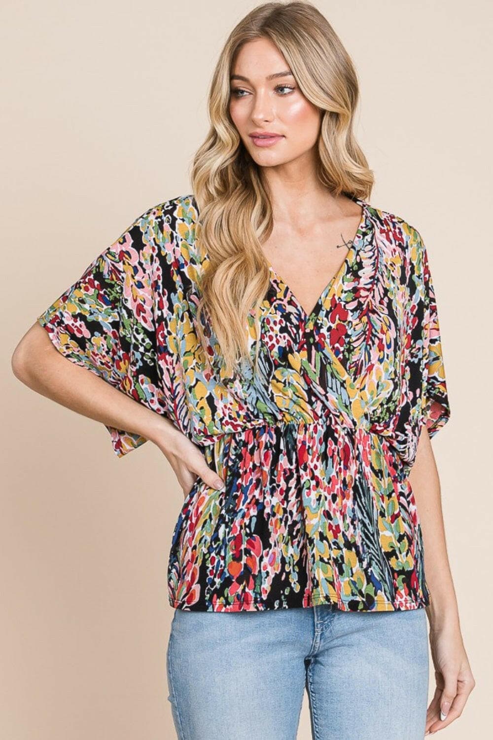 BOMBOM Printed Surplice Peplum Blouse.