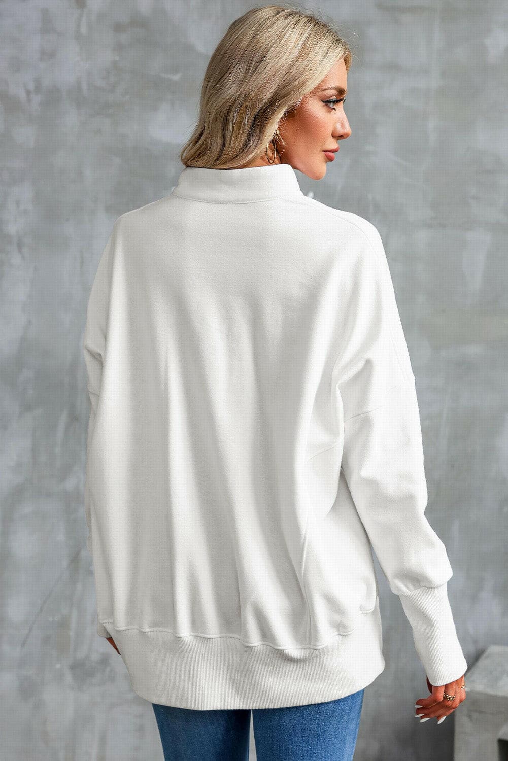 Half Zip Pocketed Dropped Shoulder Sweatshirt.