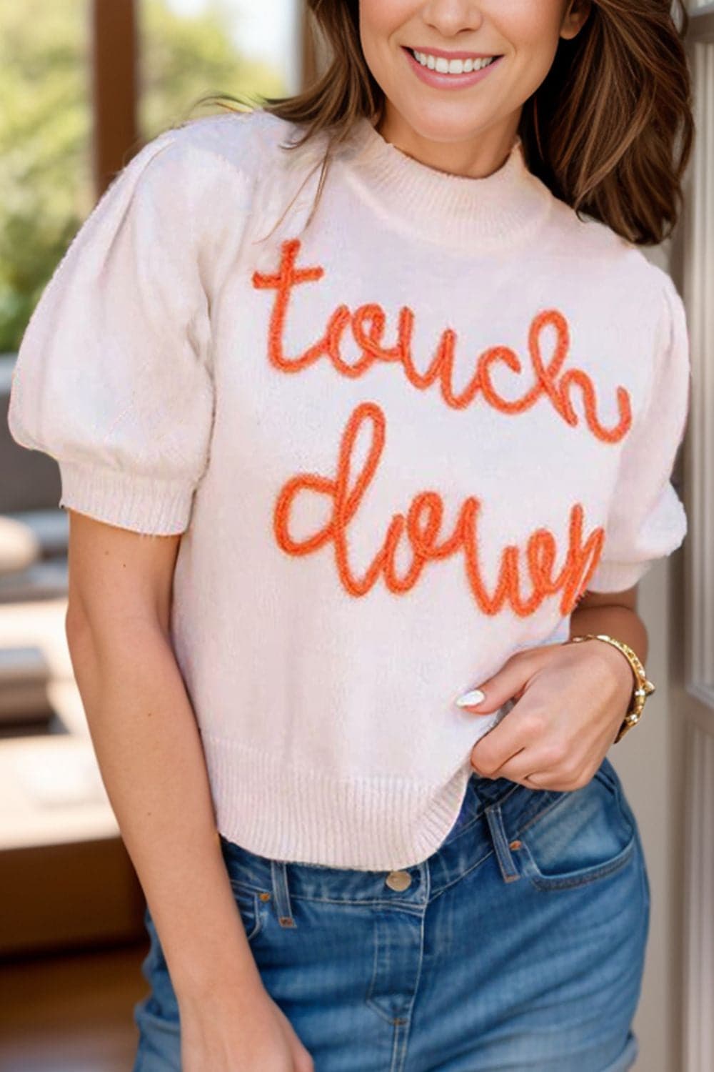 TOUCH DOWN Mock Neck Short Sleeve Knit Top.