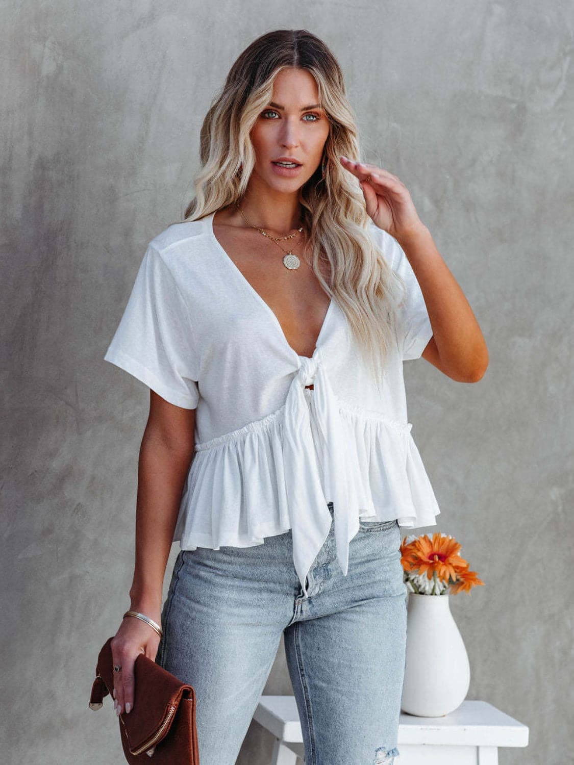 Tied Plunge Short Sleeve Blouse.