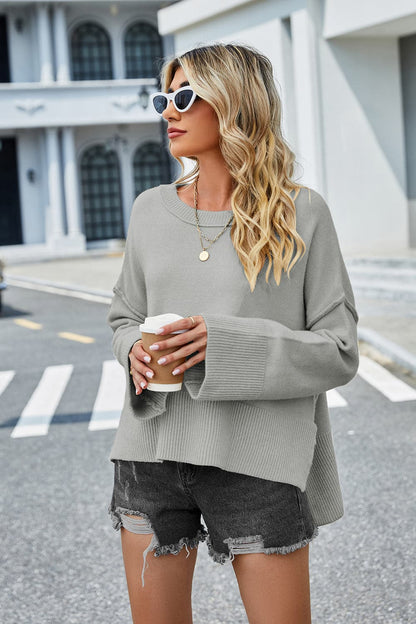 High-Low Slit Round Neck Long Sleeve Sweater.