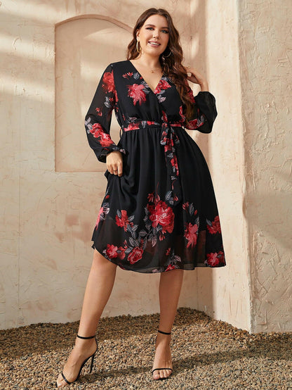 Plus Size Floral Surplice Neck Tie Waist DressUpgrade Your Wardrobe with Our Plus Size Floral Dress!
 
 
Style: Classy and Chic
 
Pattern Type: Floral
 
Neckline: Surplice
 
Length: Midi
 
Sleeve Length: Long BaLove Salve Size Floral Surplice Neck Tie Waist Dressplus