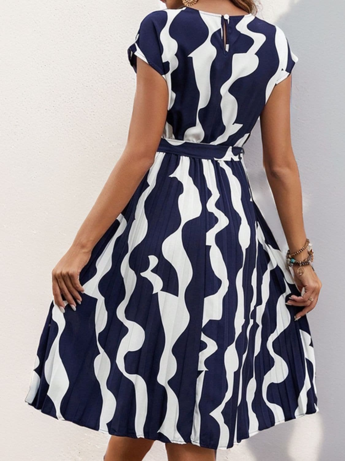 Tied Pleated Printed Cap Sleeve Dress.