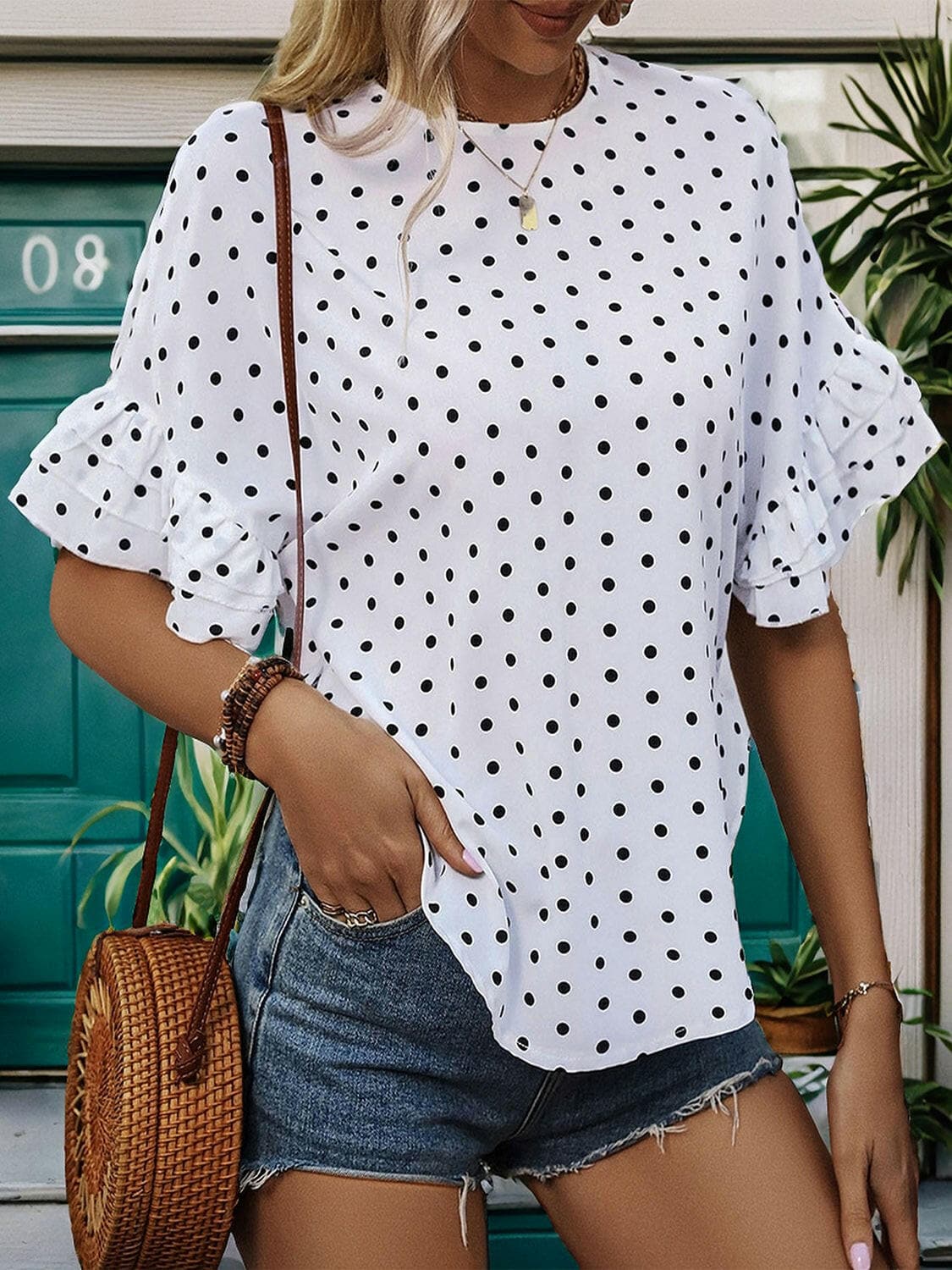 Slit Polka Dot Round Neck Half Sleeve Blouse.