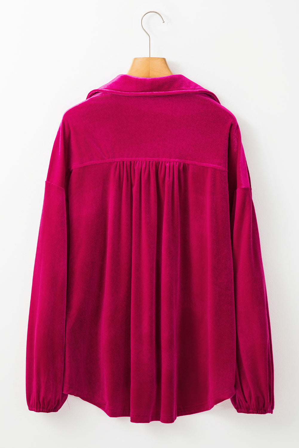 Chic pitaya pink velvet shirt with button details and V-neckline