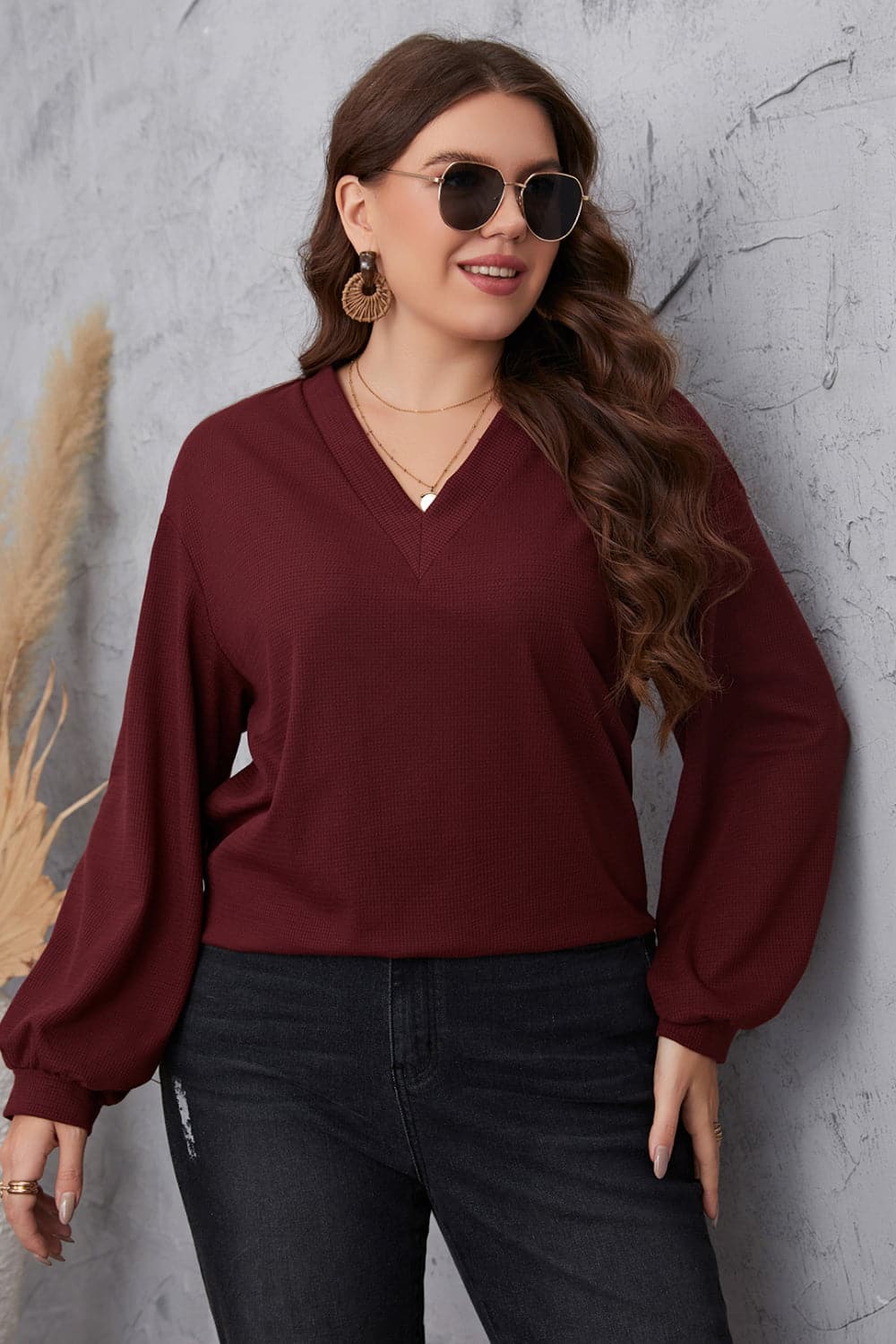 Melo Apparel Plus Size V-Neck Dropped Shoulder Blouse.