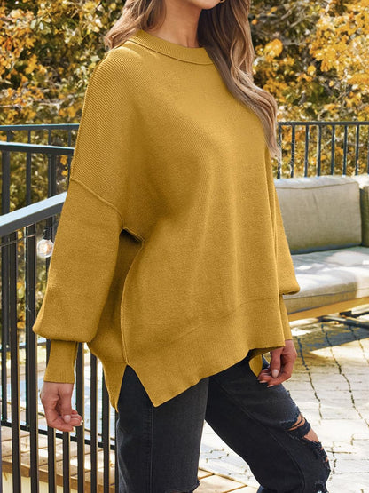 Dropped shoulder sweater with stylish slits