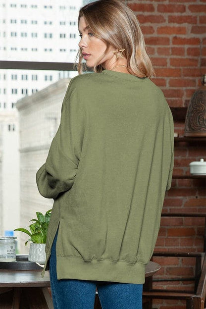 Light washed drop shoulder oversized sweatshirt.