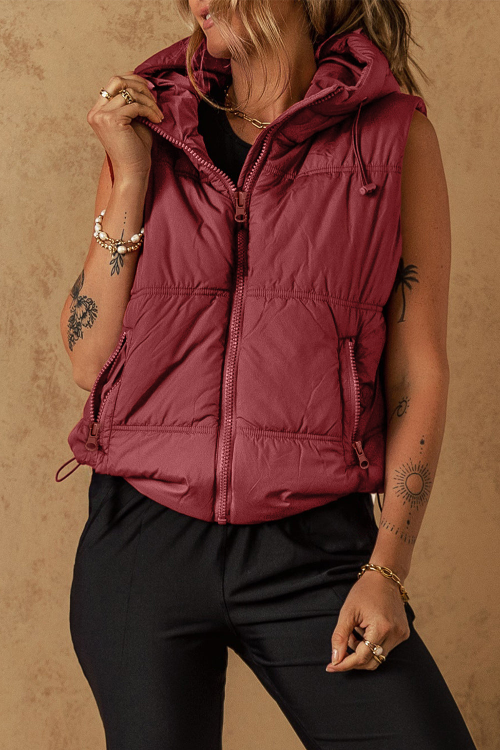 Clay hooded puffer vest with zip-up and side pockets