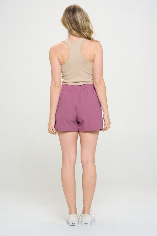 Active high waisted skort with pockets and built-in shorts