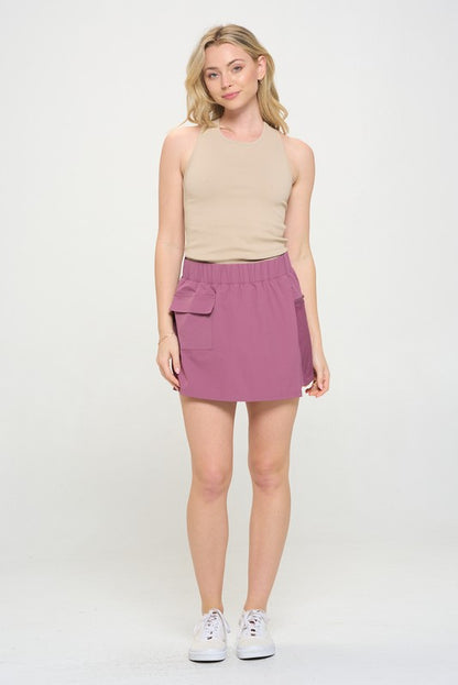 Active high waisted skort with pockets and built-in shorts