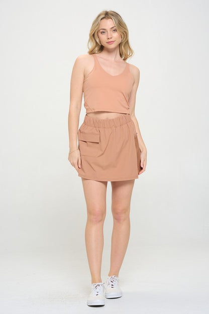 Active high waisted skort with pockets and built-in shorts