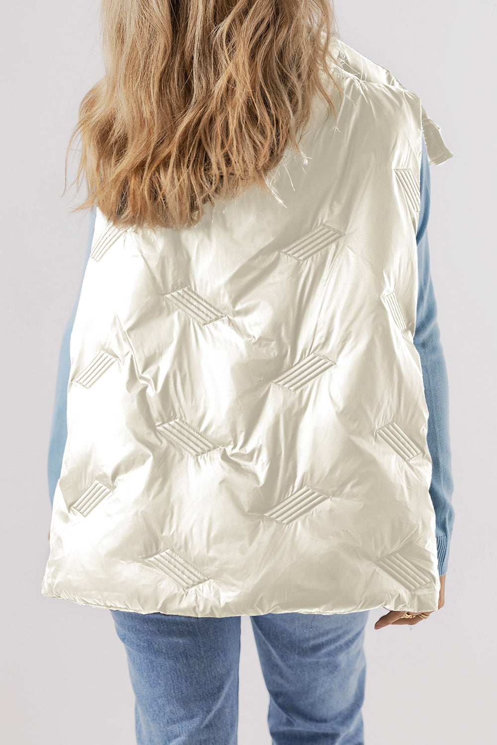 Chic white quilted high neck vest with zip closure