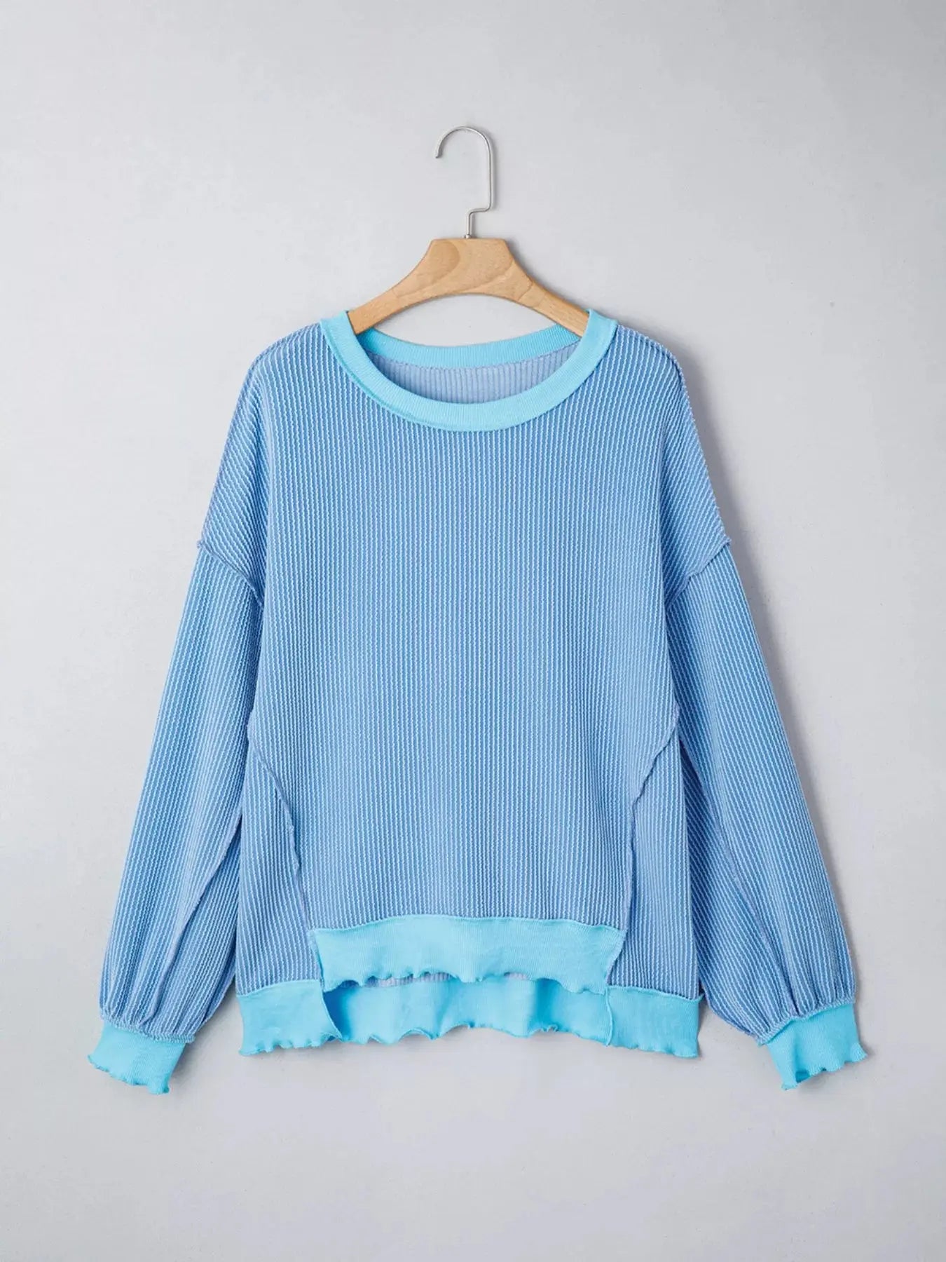 Twisted Rib Uneven Hem Drop Shoulder Loose Knit Top Simply Love