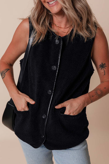 Sophisticated black fleece vest with button closure and side pockets