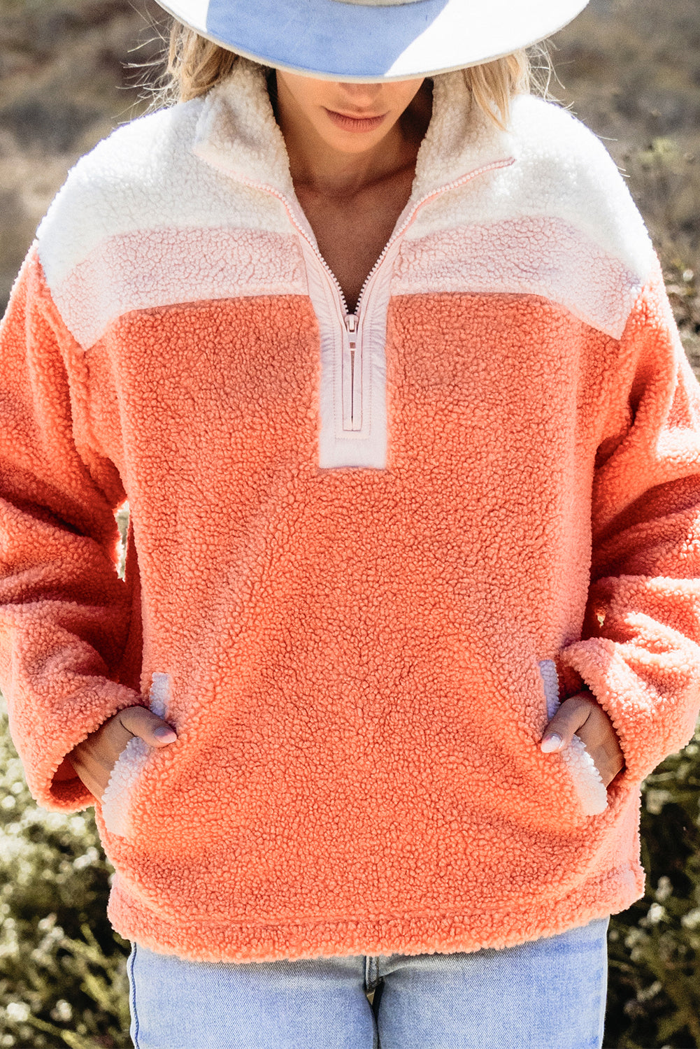 Cozy orange colorblock sherpa sweatshirt with half zipper and stand neck