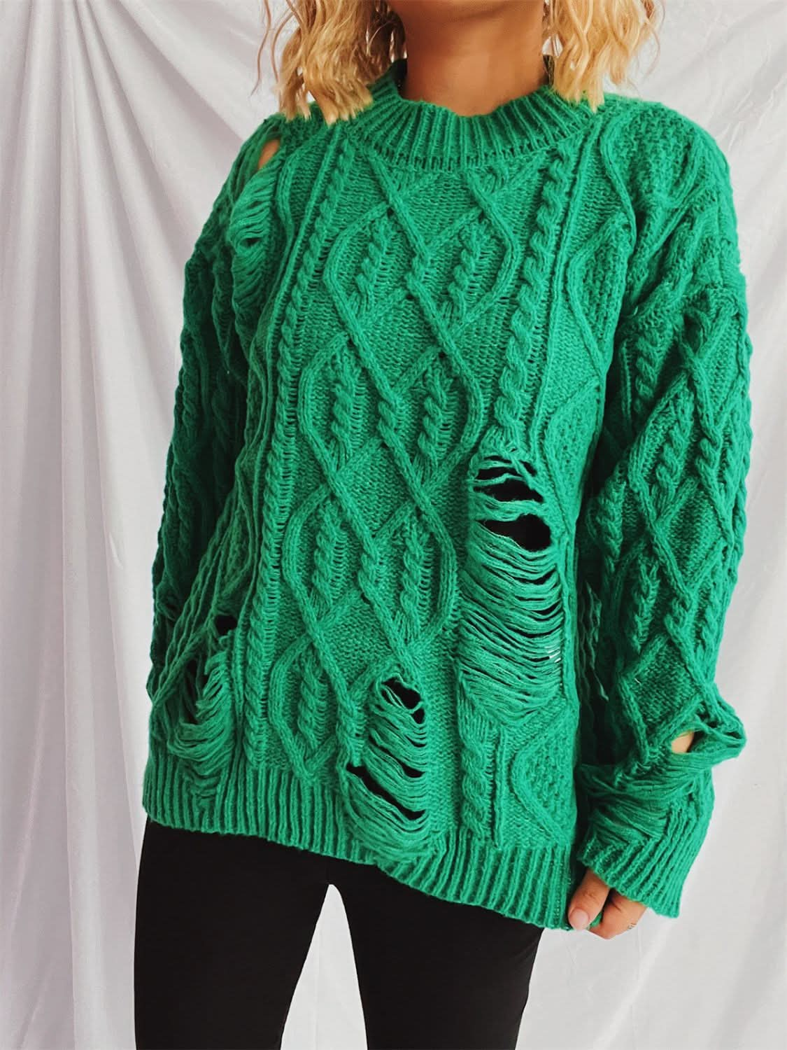 Chic distressed cable-knit sweater