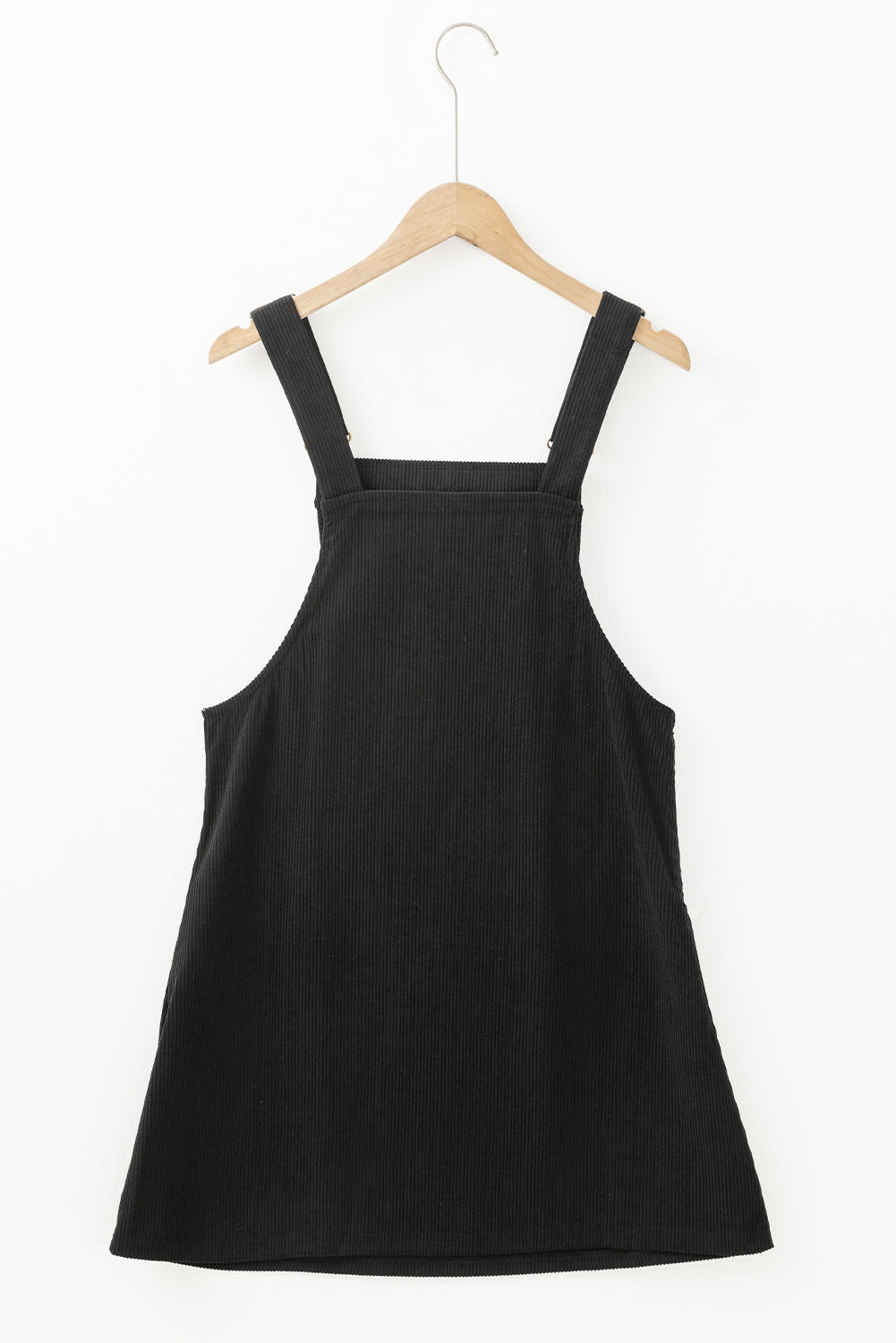 Chic black sleeveless corduroy overall dress with front pockets