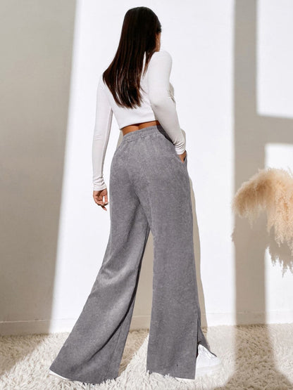 Slit Pocketed High Waist Wide Leg Pants.