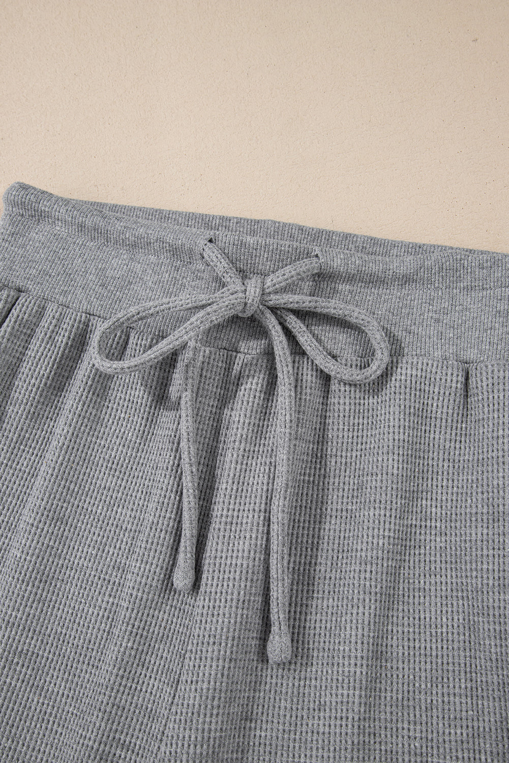 Cozy gray high-waist wide-leg pants with drawstring detail