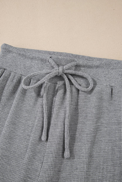 Cozy gray high-waist wide-leg pants with drawstring detail