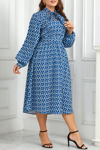 Plus Size Printed Tie Neck Midi Dress.