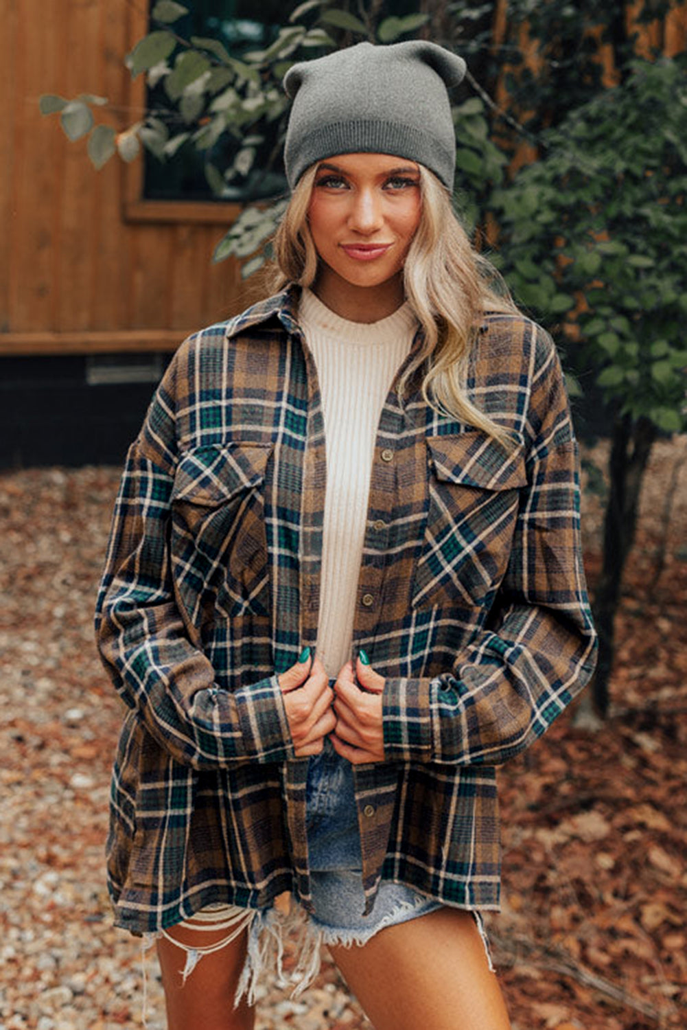 Brown plaid button-up shacket with chest pockets