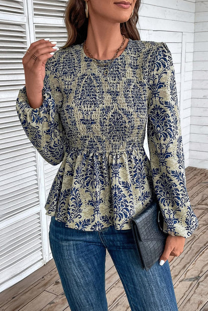 Sheer peplum blouse with print