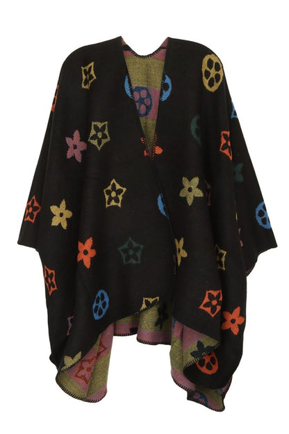 Vibrant geometric print poncho for stylish layering