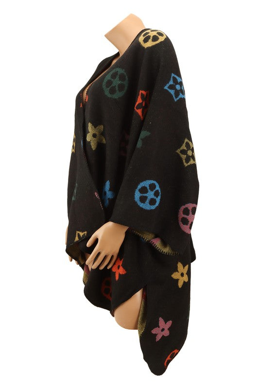 Vibrant geometric print poncho for stylish layering