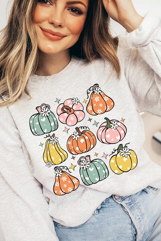 Cozy fall vibes: Retro pumpkins and daisies graphic sweatshirts