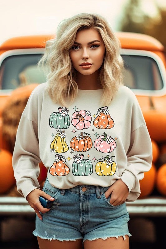 Cozy fall vibes: Retro pumpkins and daisies graphic sweatshirts