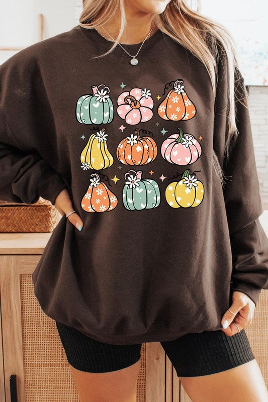 Cozy fall vibes: Retro pumpkins and daisies graphic sweatshirts