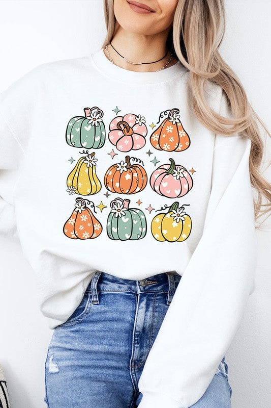 Cozy fall vibes: Retro pumpkins and daisies graphic sweatshirts