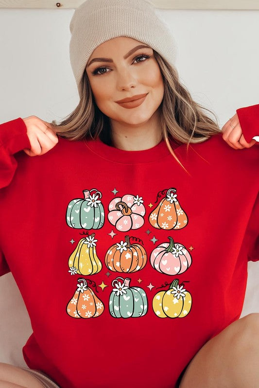 Cozy fall vibes: Retro pumpkins and daisies graphic sweatshirts