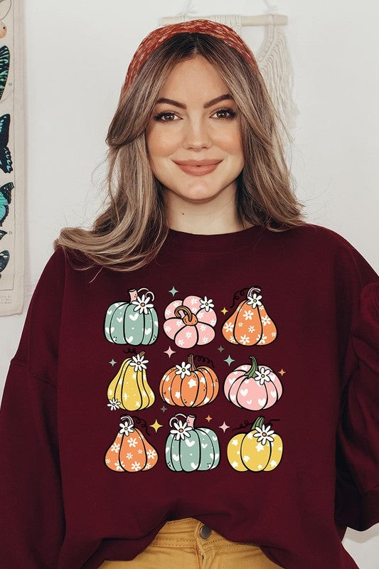 Cozy fall vibes: Retro pumpkins and daisies graphic sweatshirts