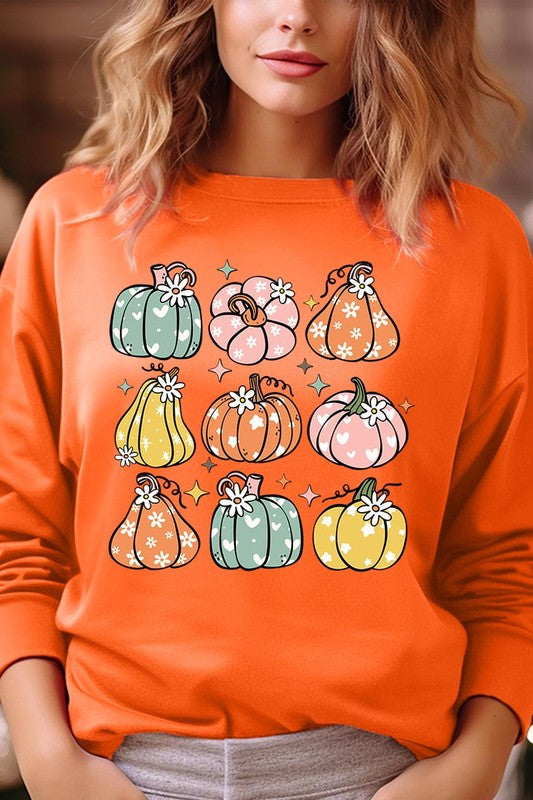 Cozy fall vibes: Retro pumpkins and daisies graphic sweatshirts