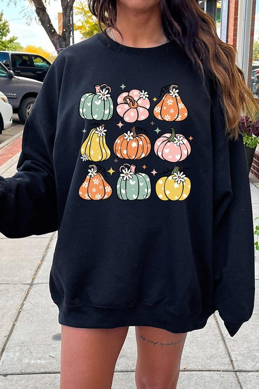 Cozy fall vibes: Retro pumpkins and daisies graphic sweatshirts