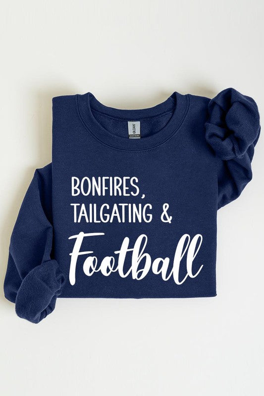 Game day vibes: Bonfires and football graphic sweatshirts