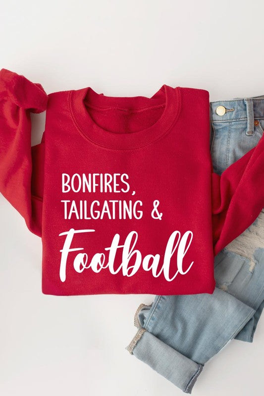 Game day vibes: Bonfires and football graphic sweatshirts