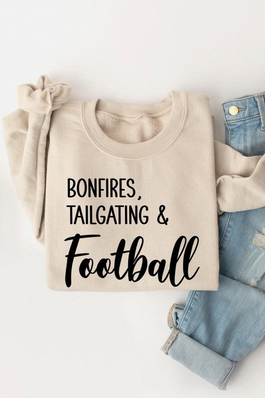 Game day vibes: Bonfires and football graphic sweatshirts