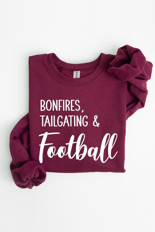 Game day vibes: Bonfires and football graphic sweatshirts