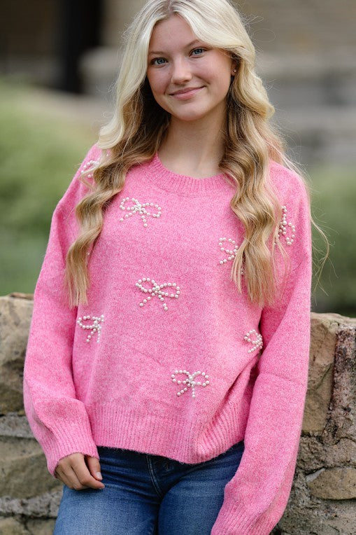 Miss Sparkling pearl bow knit sweater, ivory color. Cozy and stylish women's sweater with pearl embellishments.