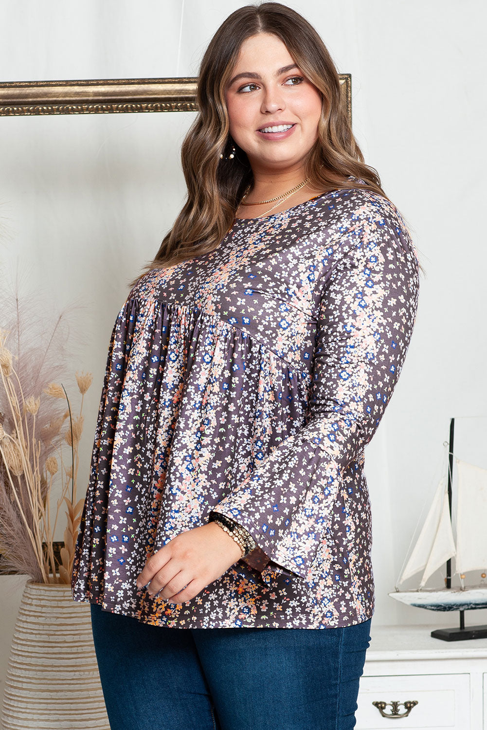 Charming purple floral plus size babydoll top with round neckline