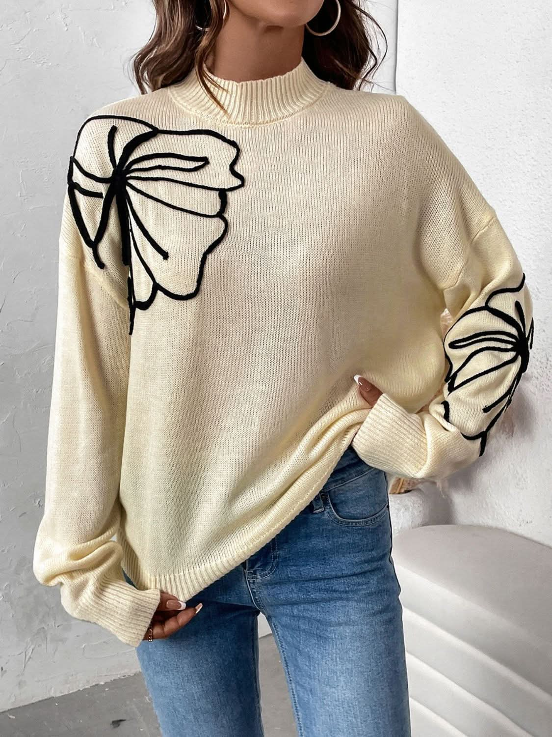 Cozy mock neck sweater with dropped shoulders and long sleeves