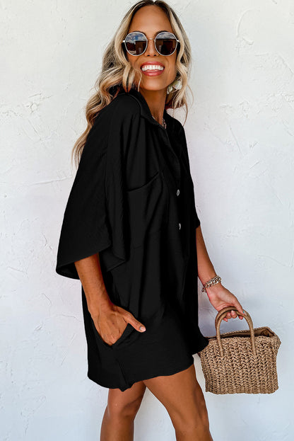 Chic black half-button collared loose romper for everyday style